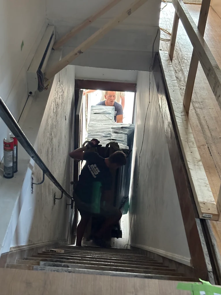 Piano on staircase during long-distance move