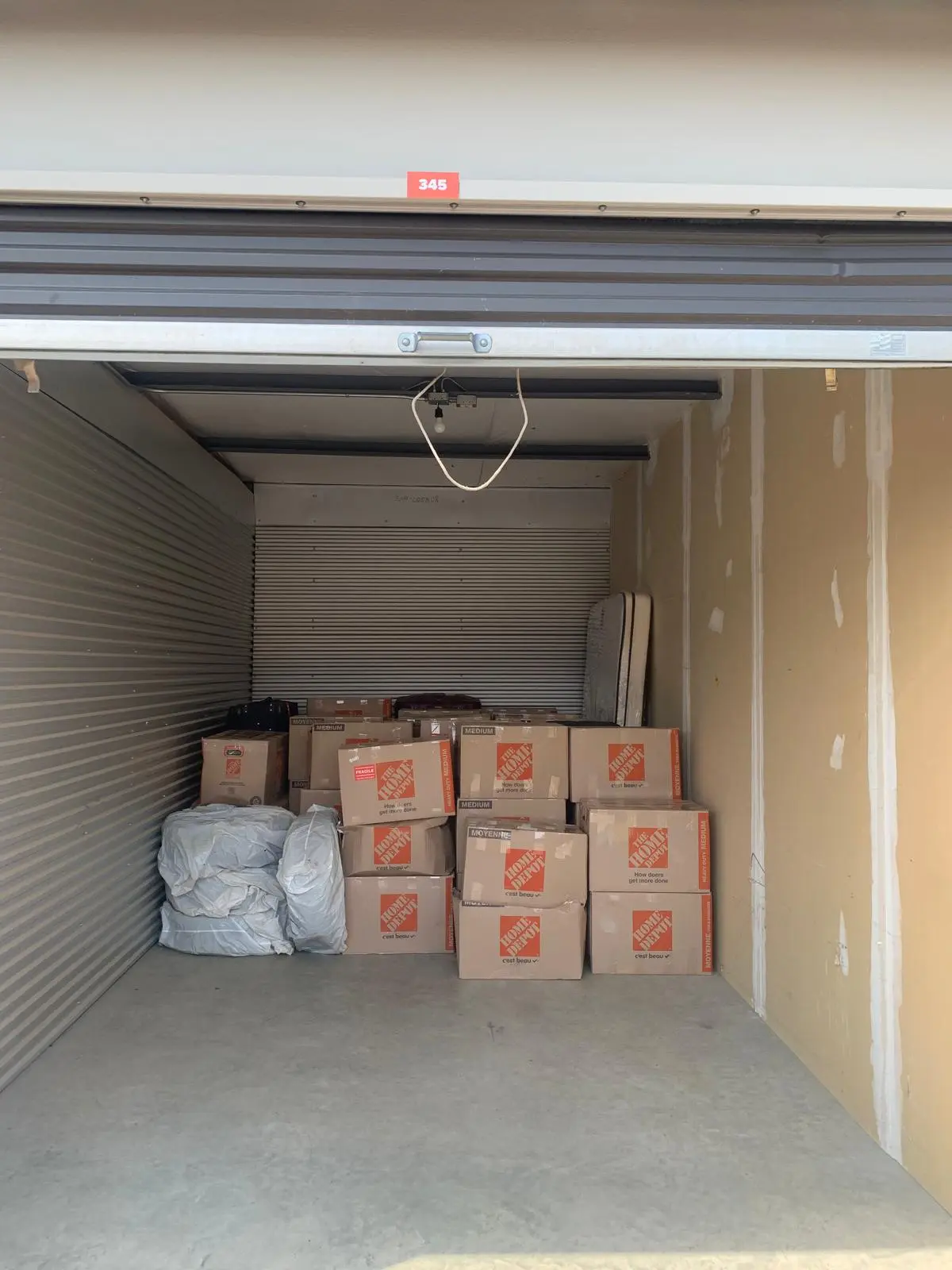 Boxes neatly stacked in a storage unit