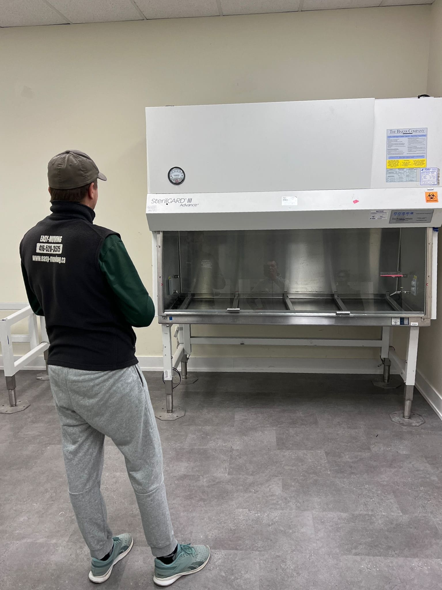 Heavy machine repositioned inside Thornhill commercial unit